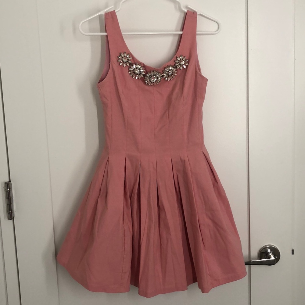 Pink dress with tulle skirt and jeweled neckline